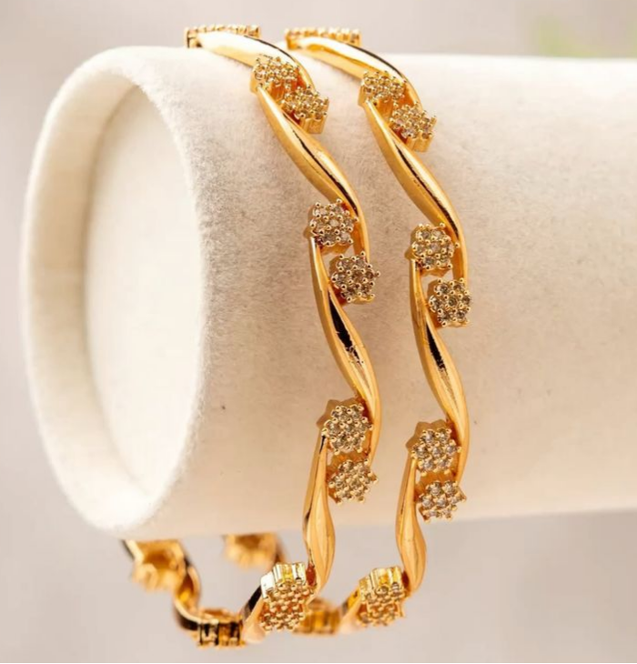 Elegant gold rolled bangles with a radiant finish